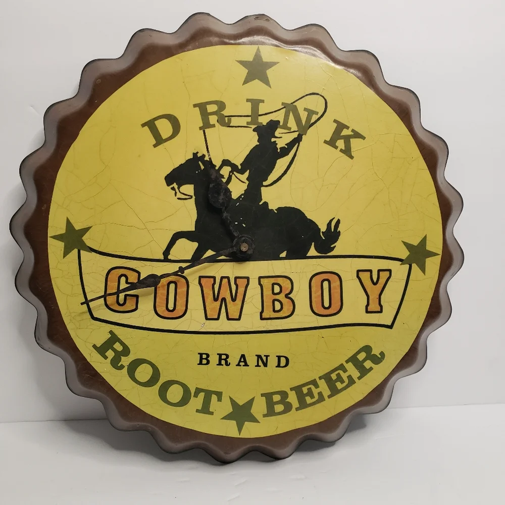 Metal Cowboy clock shaped like bottle cap. 191